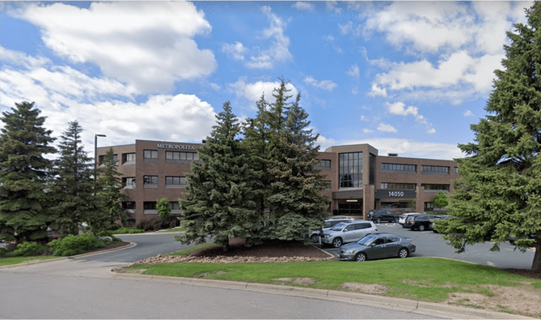 An exterior image of a commercial office building in Burnsville, Minnesota where an Ellie Mental Health Therapy & Psychiatry Clinic is located.